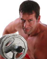 man strength training with dumbbell